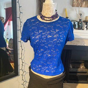 Jeans by Christian Lacroix lacy top